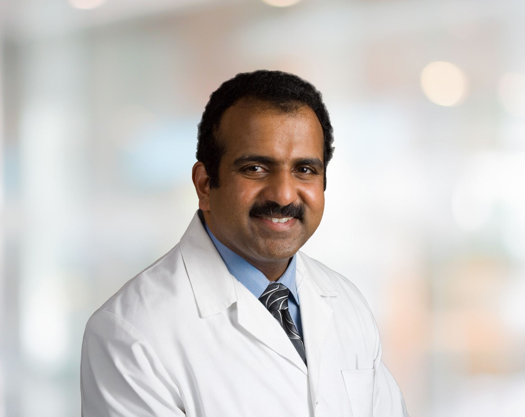 Ajit K. Tharakan, MBBS, M.D., M.S., MCh, FACS